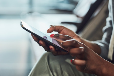 African American woman using her cell phone