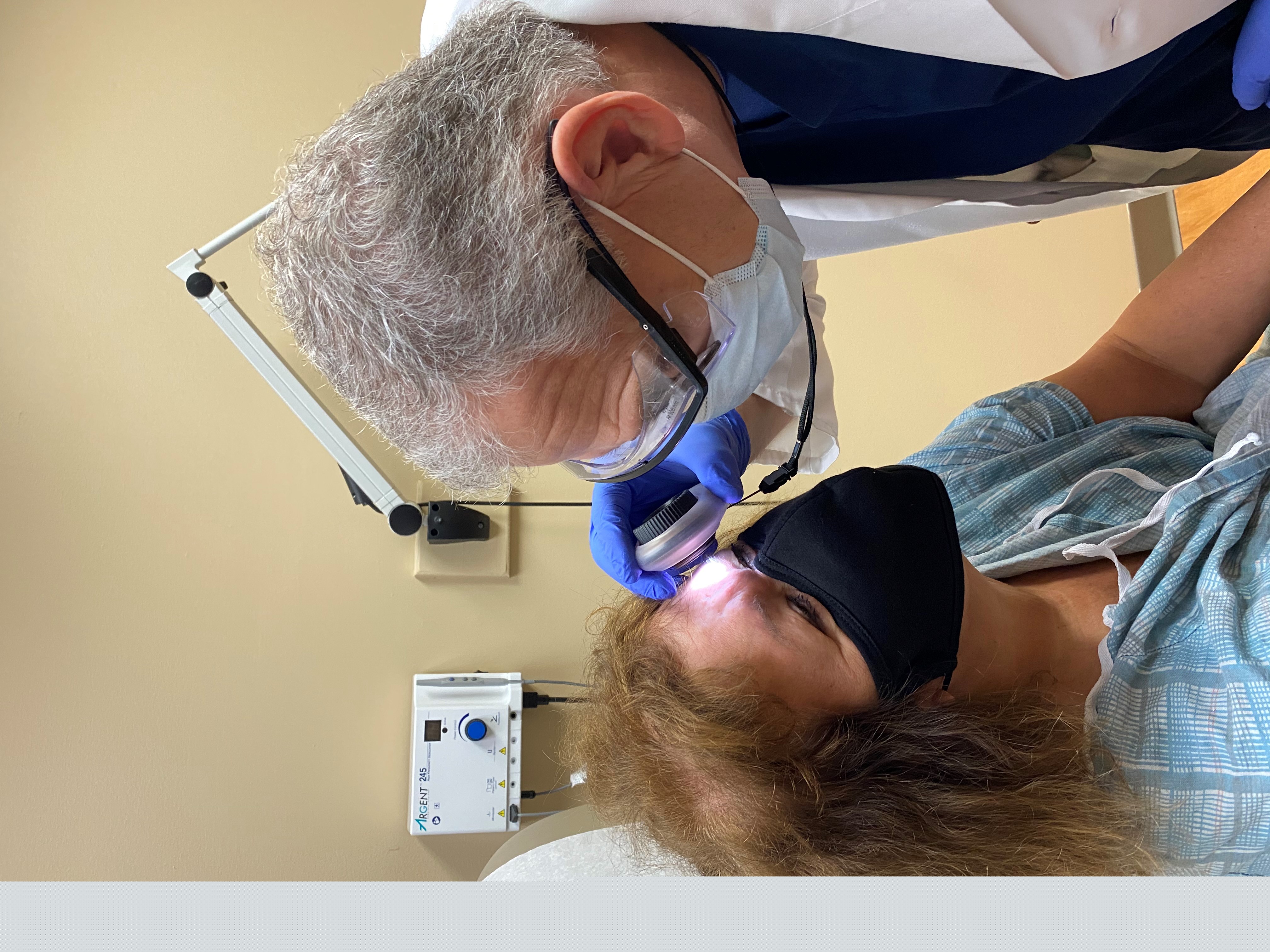 Dr. Heymann and patient